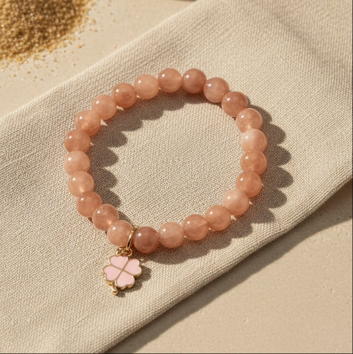 Bracelet en pierres naturelles de quartz rose, symbole d’amour et de paix intérieure, création artisanale signée Le Figuier d’Orient.