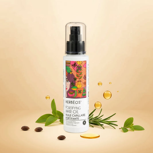 Huile fortifiante et stimulante naturelle Le Figuier d’Orient – soin anti-chute pour la repousse et la vitalité des cheveux, présentée sur fond beige doré naturel et élégant, avec ingrédients végétaux autour.