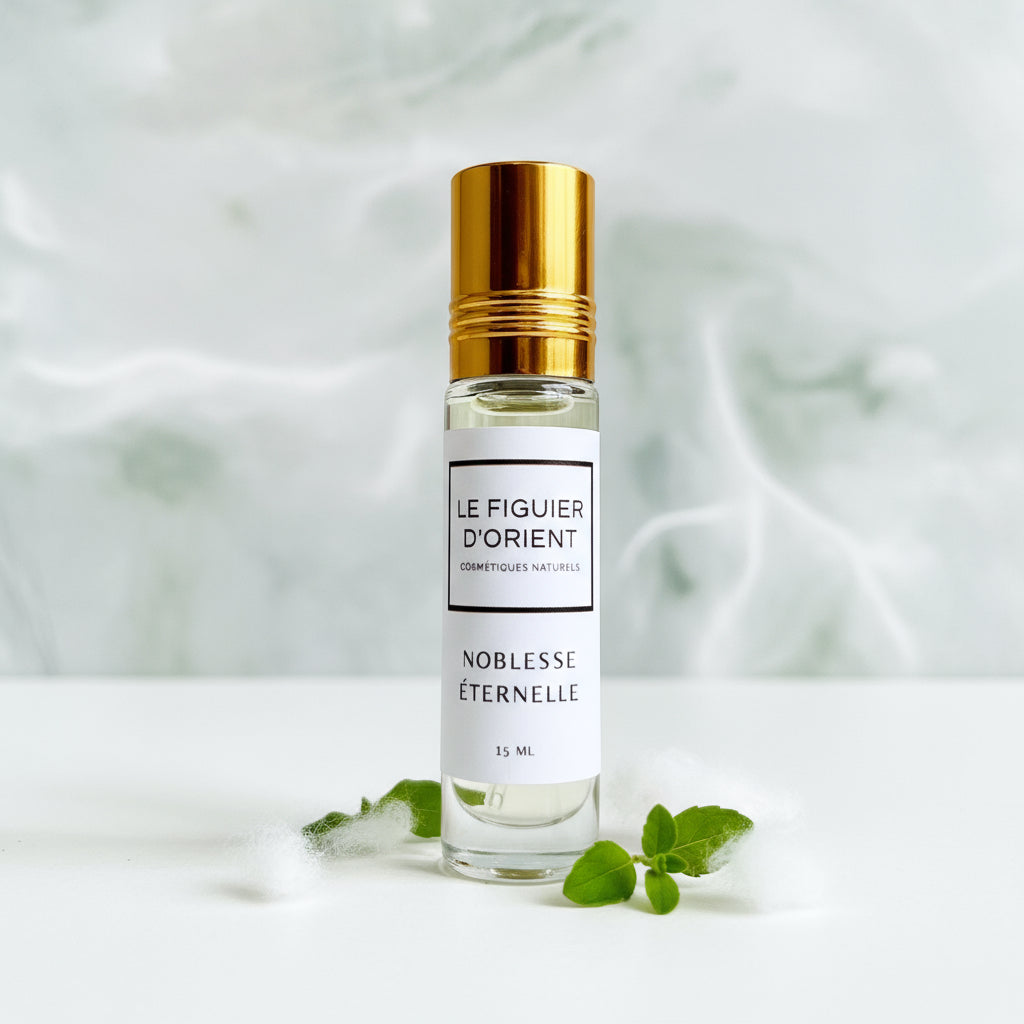 Flacon du parfum Noblesse Éternelle de la marque Le Figuier d’Orient, composé de musc blanc et d’extrait naturel de verveine. Parfum pur, apaisant et élégant, symbole de paix intérieure.